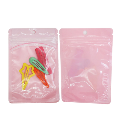 kopen Op maat gedrukte roze kleur eenzijdige heldere zak Plastic zakken met rits met hanggat voor snoep, koekjes, accessoires online manufacture