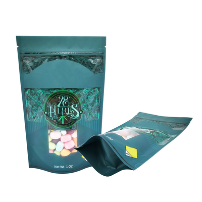kopen 1 OZ Matte Spot UV Print Stand Up Bags met hervergrendelbare rits en venster voor wiet, kruiden, snoepverpakkingen online manufacture
