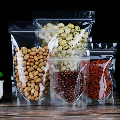 kopen Plastic hervergrendelbare heldere opstaande zakjes met zip slot met traan notch voor snoep, snacks, gedroogd fruit, voedselverpakking online manufacture